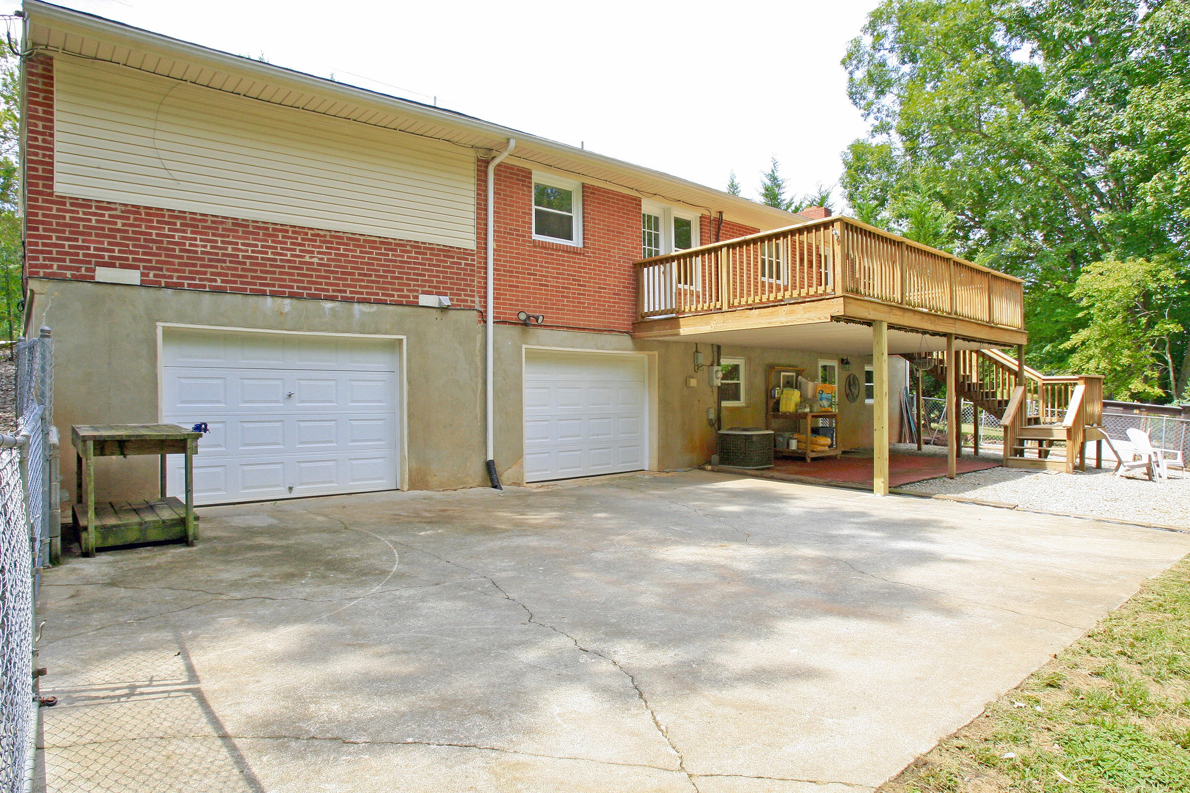 2960 Eton Road Hardy, VA 24101 - Photo 30 of 43 a front view of a house with a yard and garage
