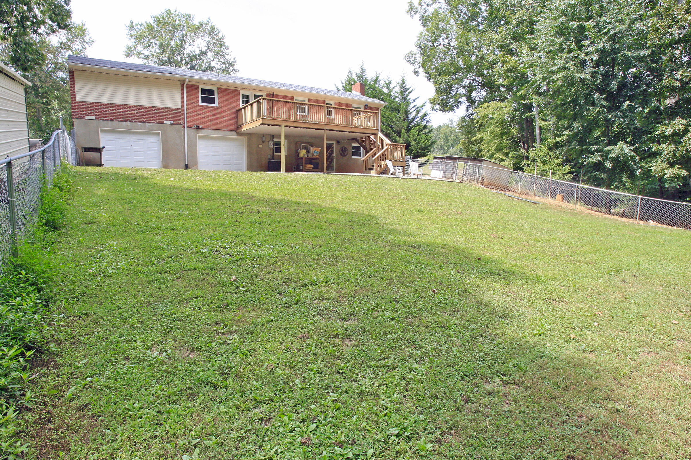 2960 Eton Road Hardy, VA 24101 - Photo 37 of 43 a front view of house with yard and trees in the background