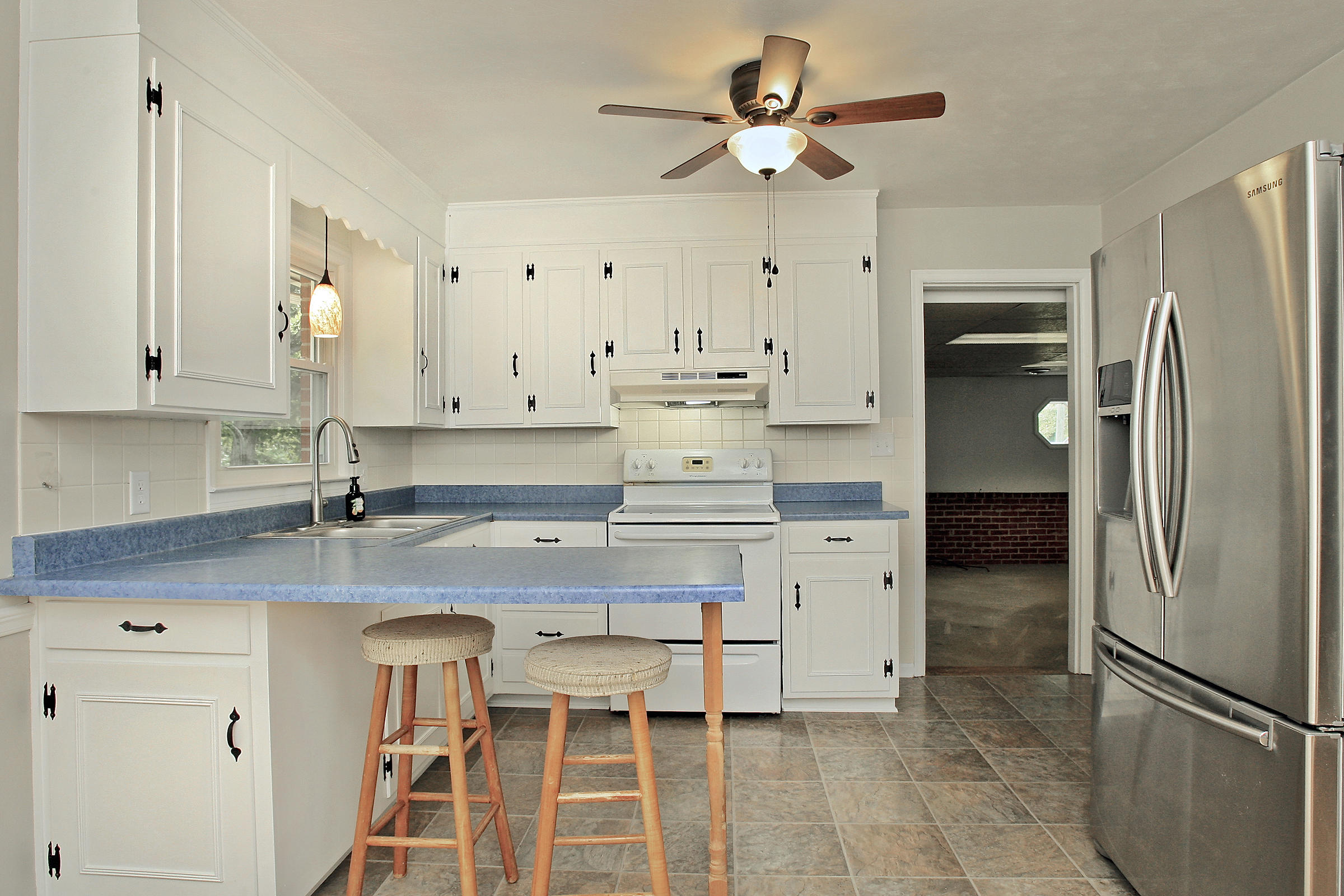 2960 Eton Road Hardy, VA 24101 - Photo 10 of 43 a kitchen with stainless steel appliances a refrigerator sink and cabinets