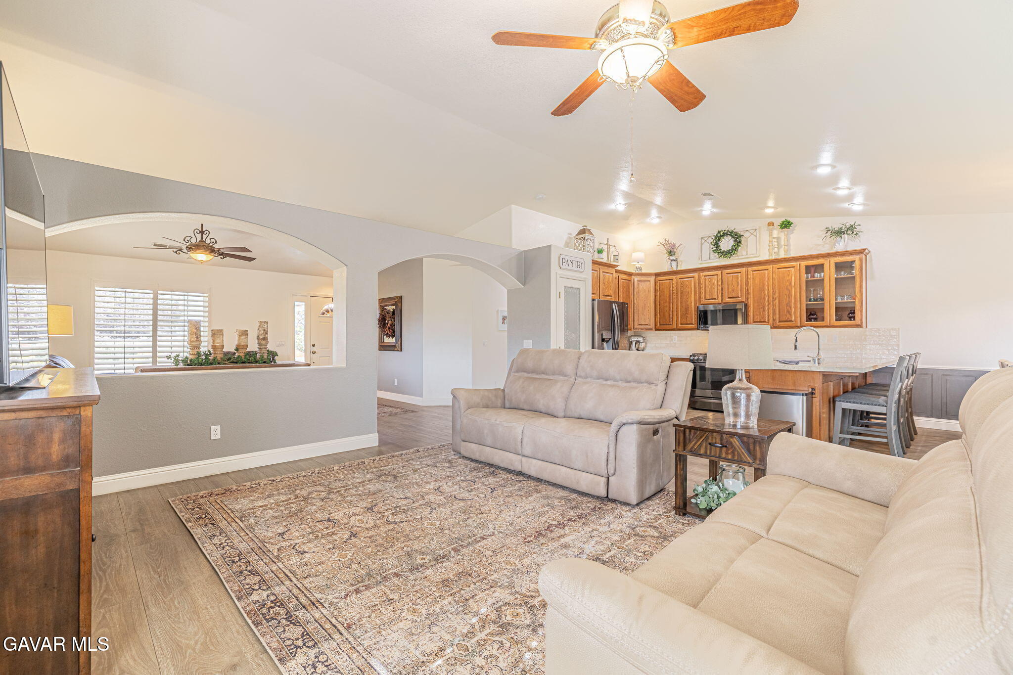 19812 Breeze Place Tehachapi, CA 93561 - Photo 13 of 59 a living room with furniture and kitchen view