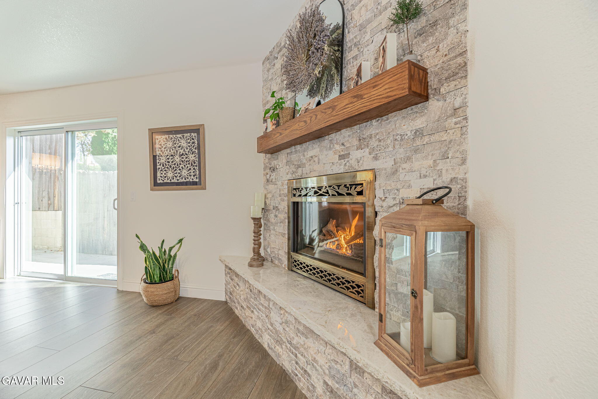 19812 Breeze Place Tehachapi, CA 93561 - Photo 15 of 59 a living room with furniture and a fireplace