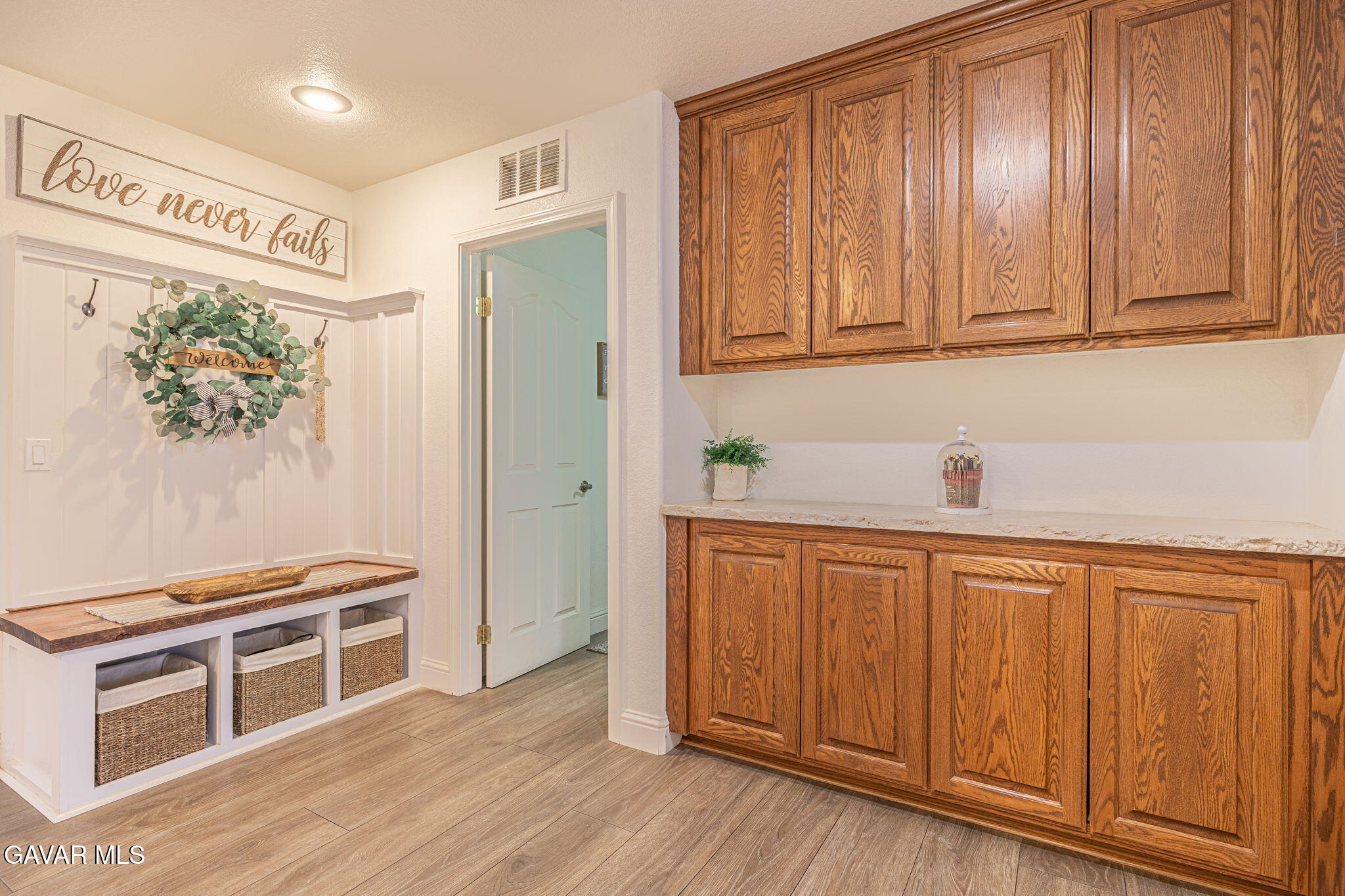 19812 Breeze Place Tehachapi, CA 93561 - Photo 24 of 59 a kitchen with stainless steel appliances granite countertop a refrigerator and a stove top oven