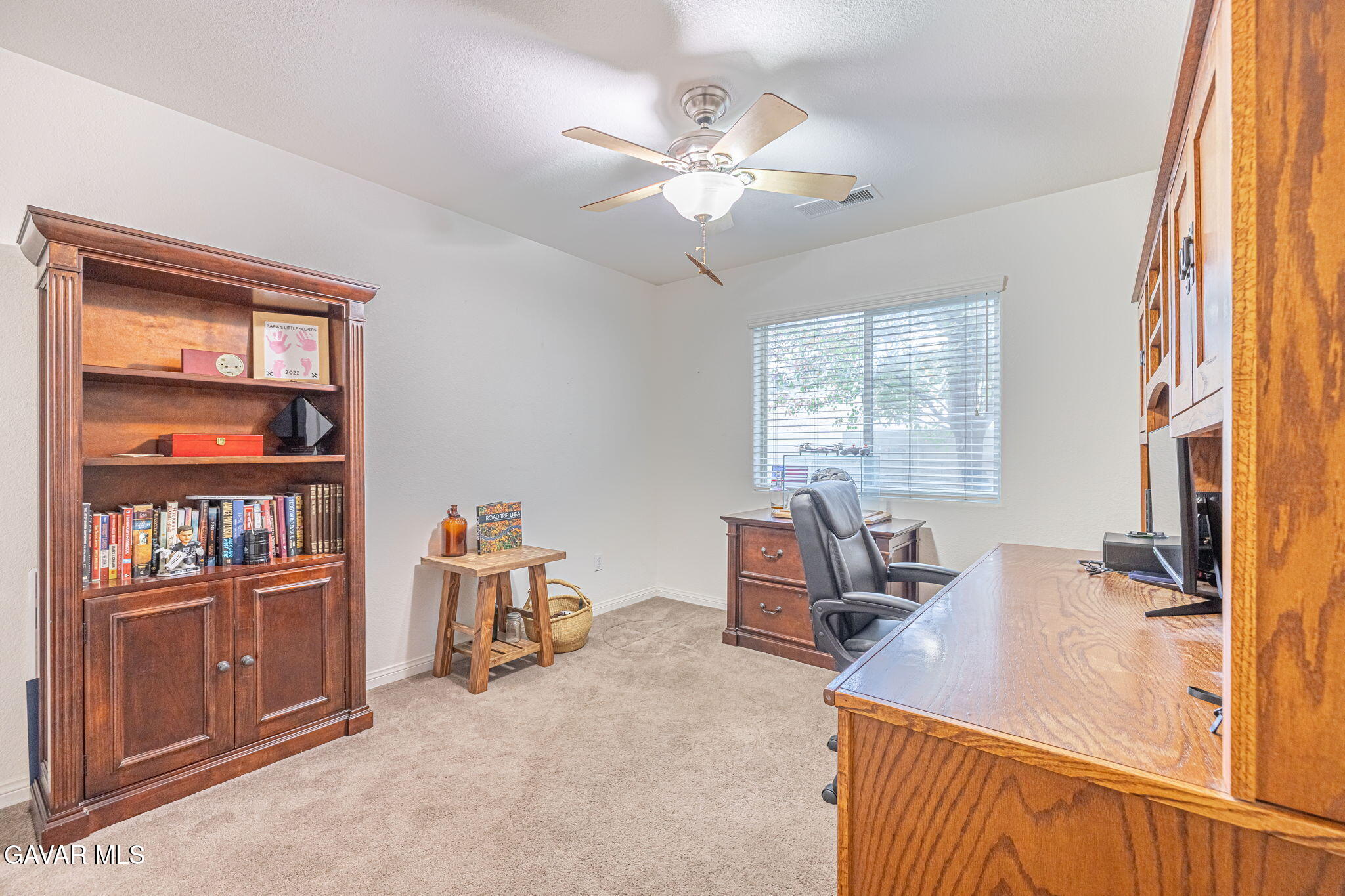 19812 Breeze Place Tehachapi, CA 93561 - Photo 26 of 59 a view of a workspace with furniture and a window