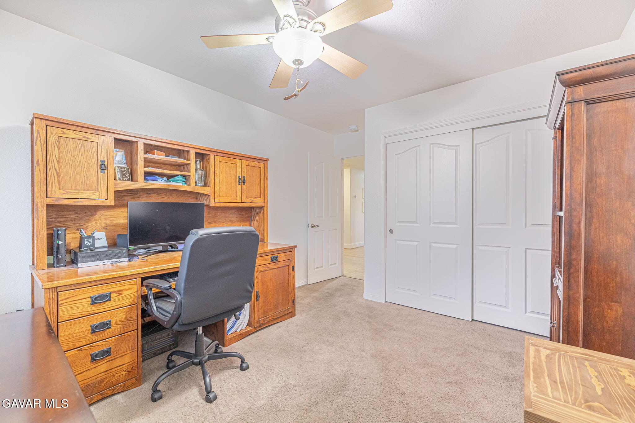 19812 Breeze Place Tehachapi, CA 93561 - Photo 27 of 59 a view of a workspace with furniture and a window