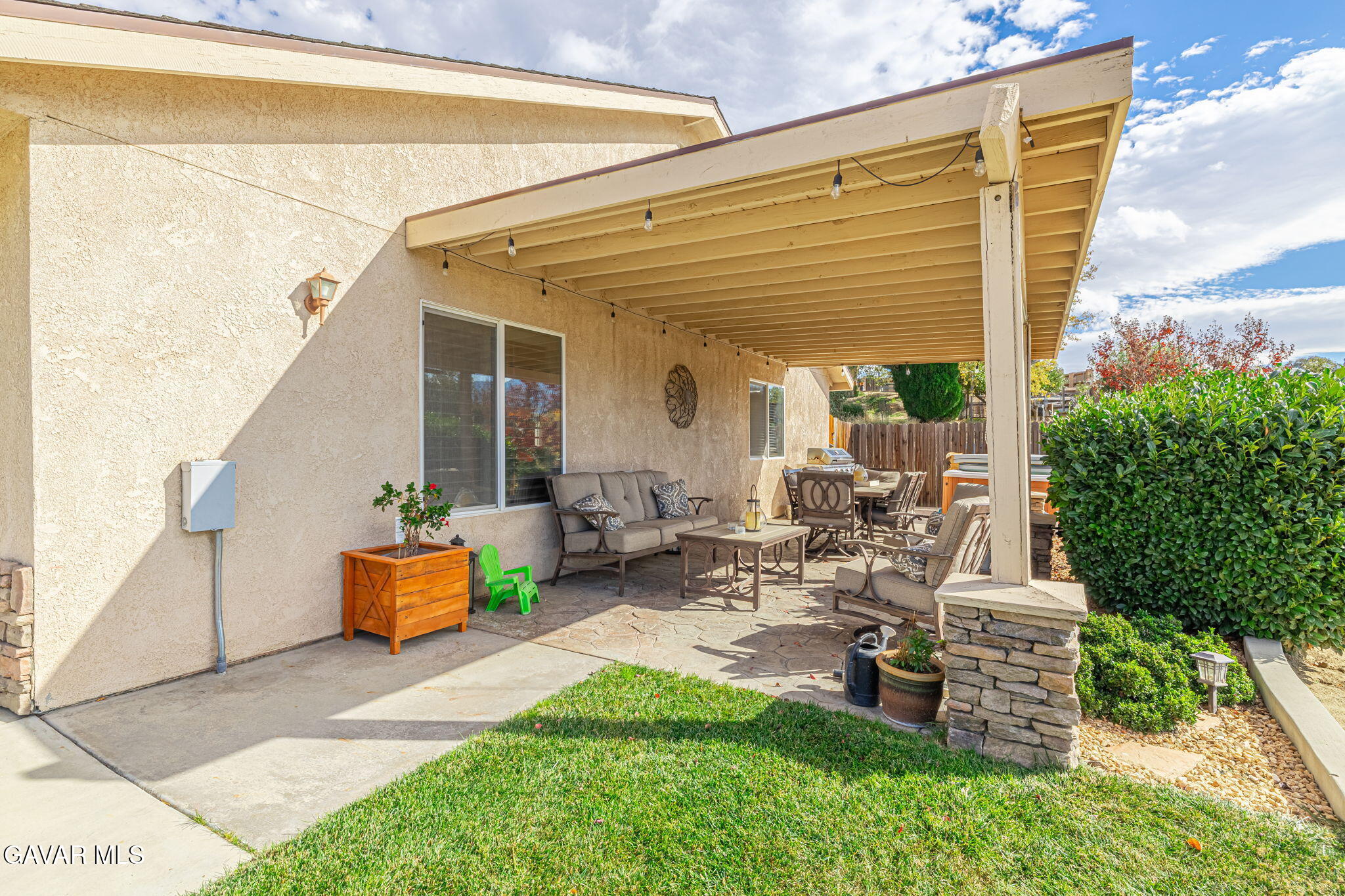 19812 Breeze Place Tehachapi, CA 93561 - Photo 35 of 59 a view of a patio with table and chairs and potted plants