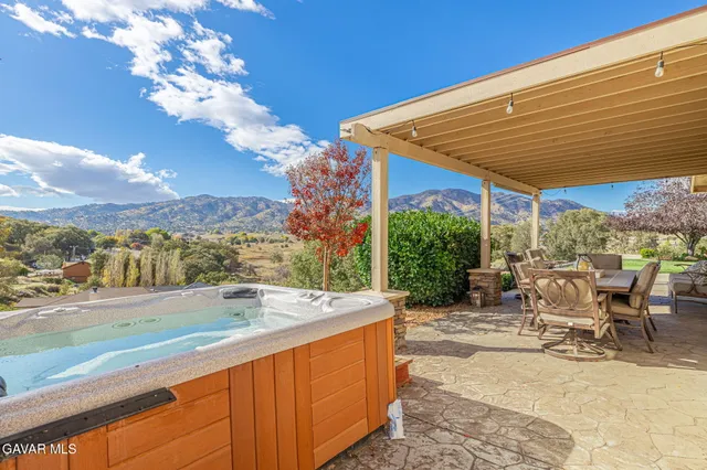 a view of a city with mountains in the background