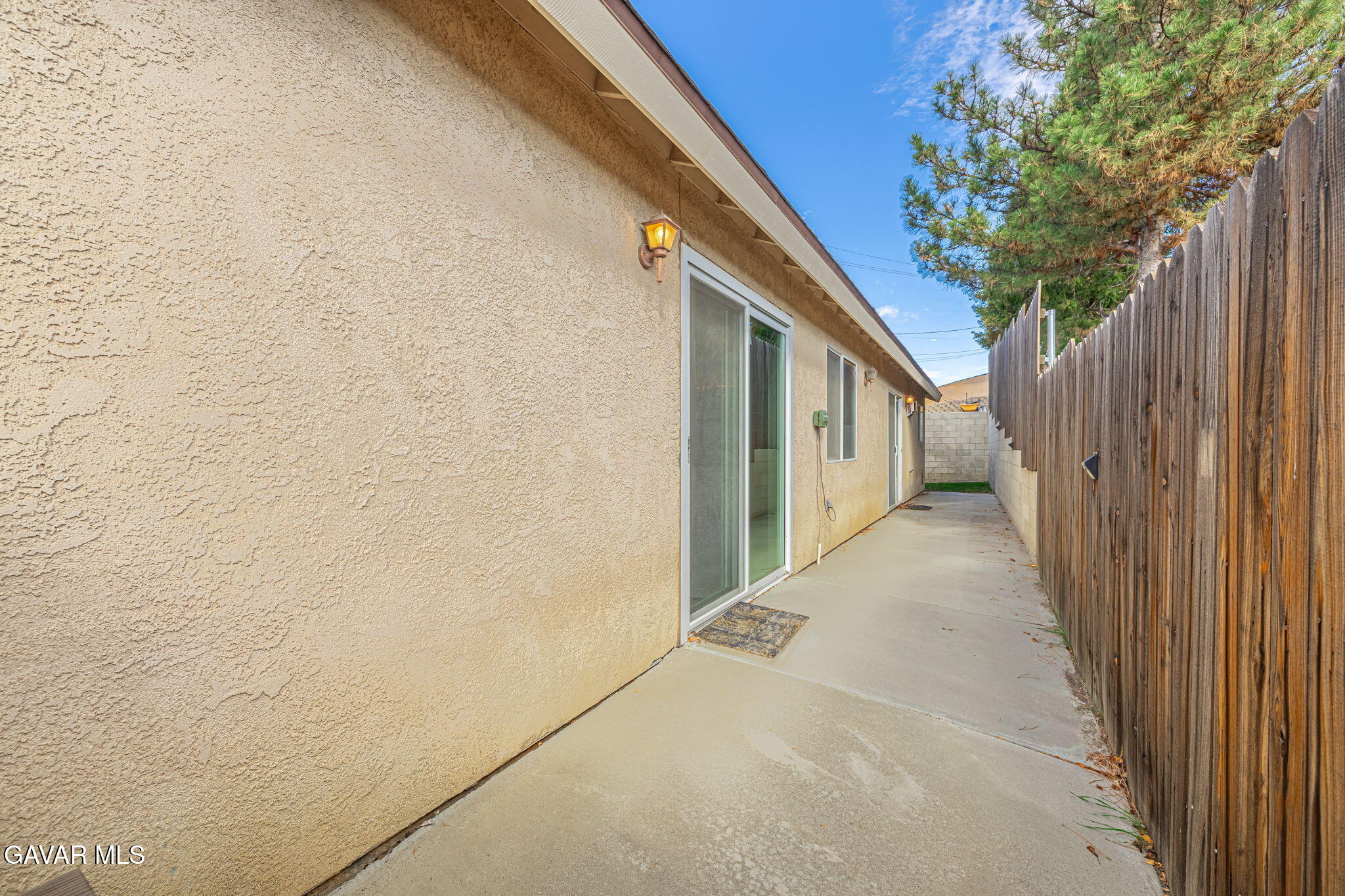 19812 Breeze Place Tehachapi, CA 93561 - Photo 42 of 59 a view of a pathway of a house with wooden fence