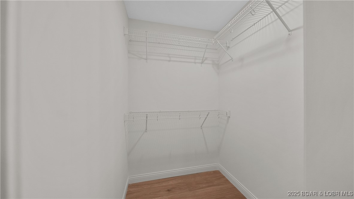 1 St Road Osage Beach, MO 65065 - Photo 30 of 41 Primary Bedroom Walk-In Closet
