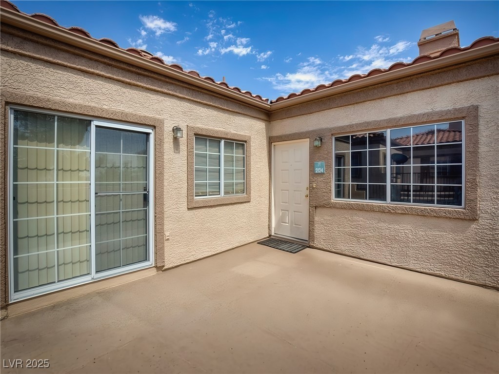1851 Hillpointe Road, Unit 2124 Henderson, NV 89074 - Photo 3 of 24 Entrance to property with a patio area and stucco siding