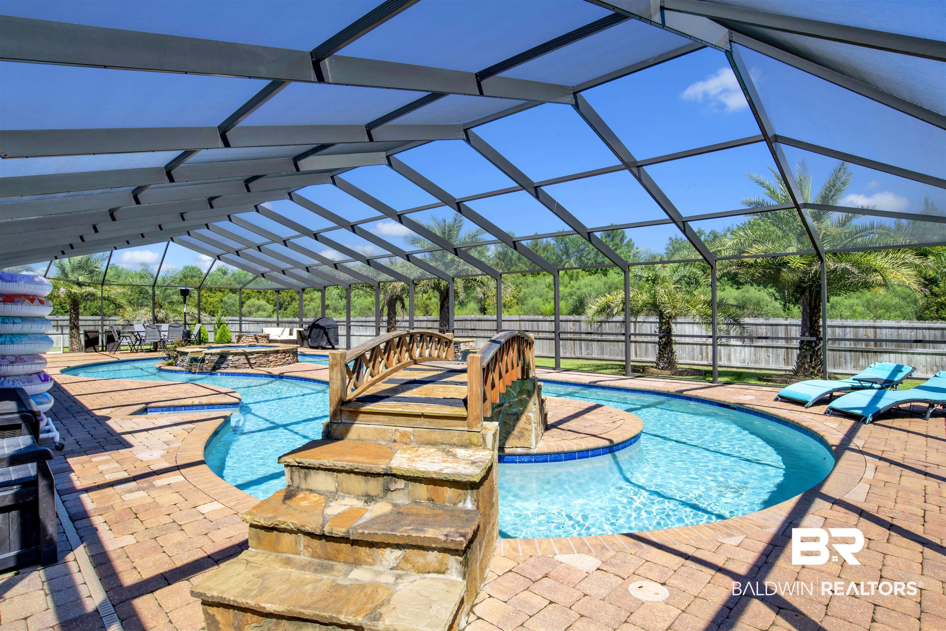 4196 Inverness Circle Gulf Shores, AL 36542 - Photo 34 of 43 View of pool featuring a lanai, an in ground hot tub, and a patio