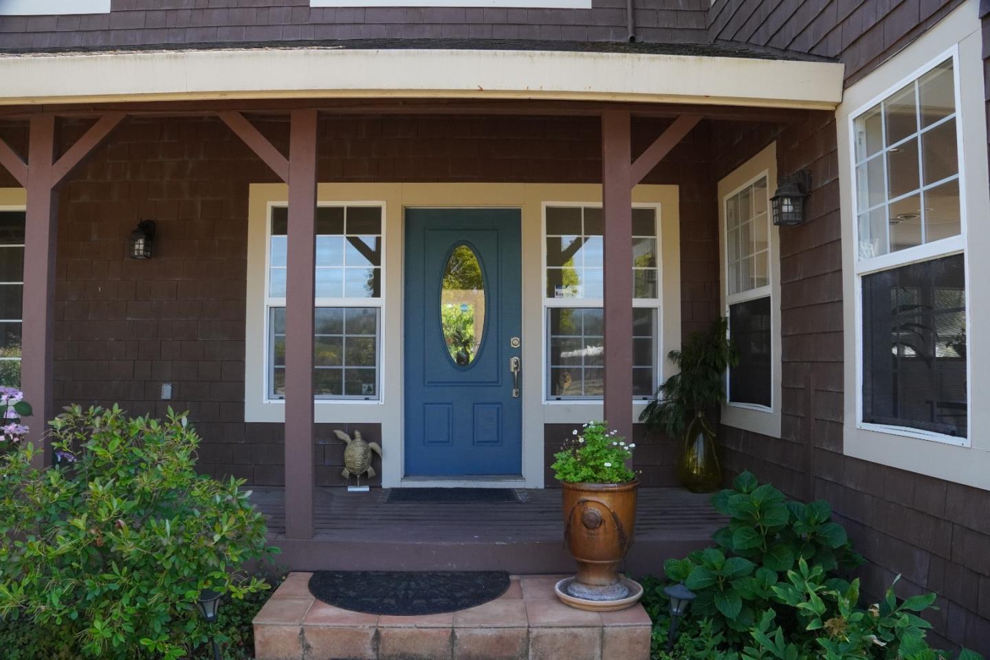 389 Corralitos Road Watsonville, CA 95076 - Photo 3 of 18 a front view of a house with a yard