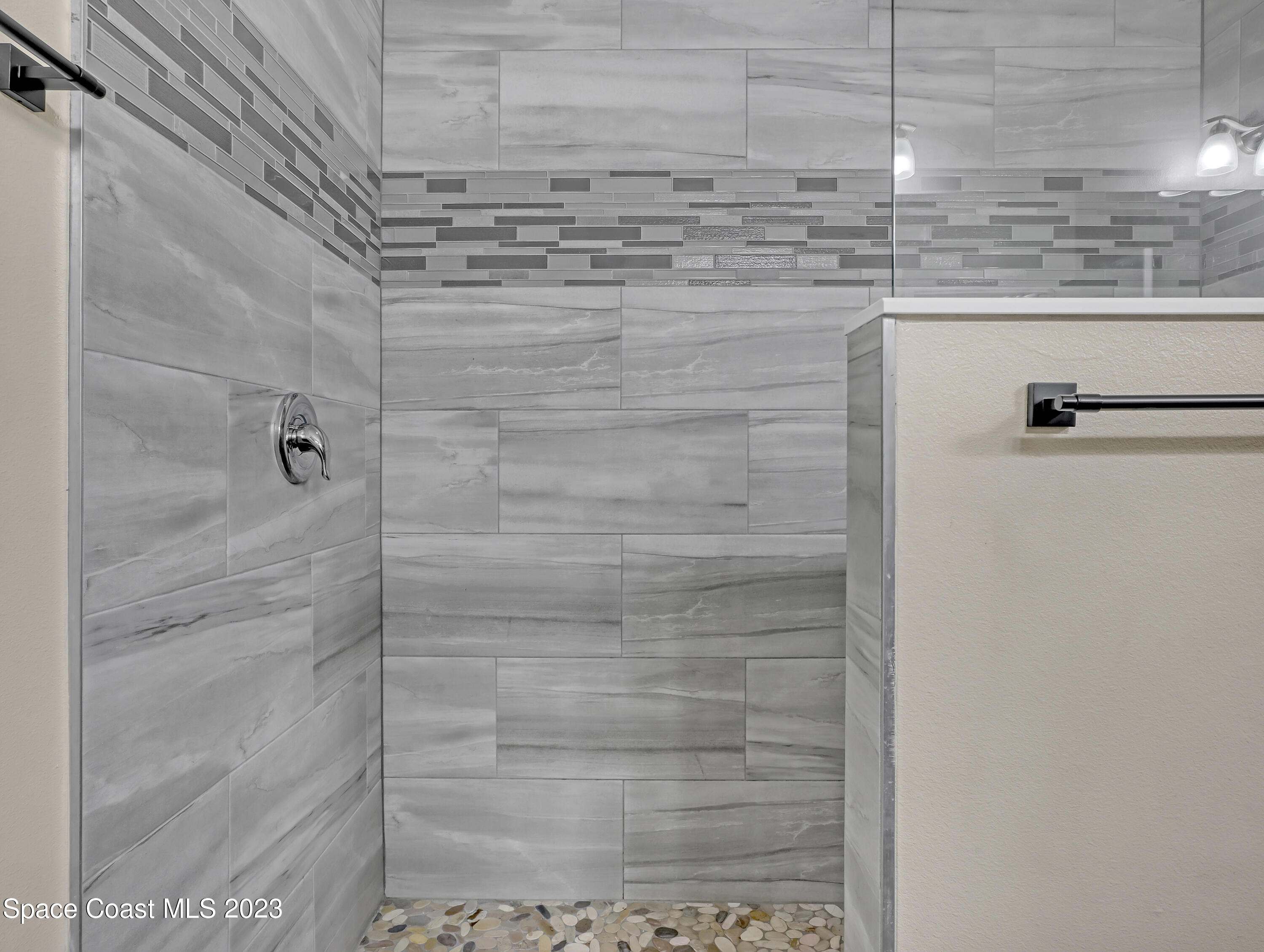1310 Gaucho Road Southwest Palm Bay, FL 32908 - Photo 15 of 32 a bathroom with a shower