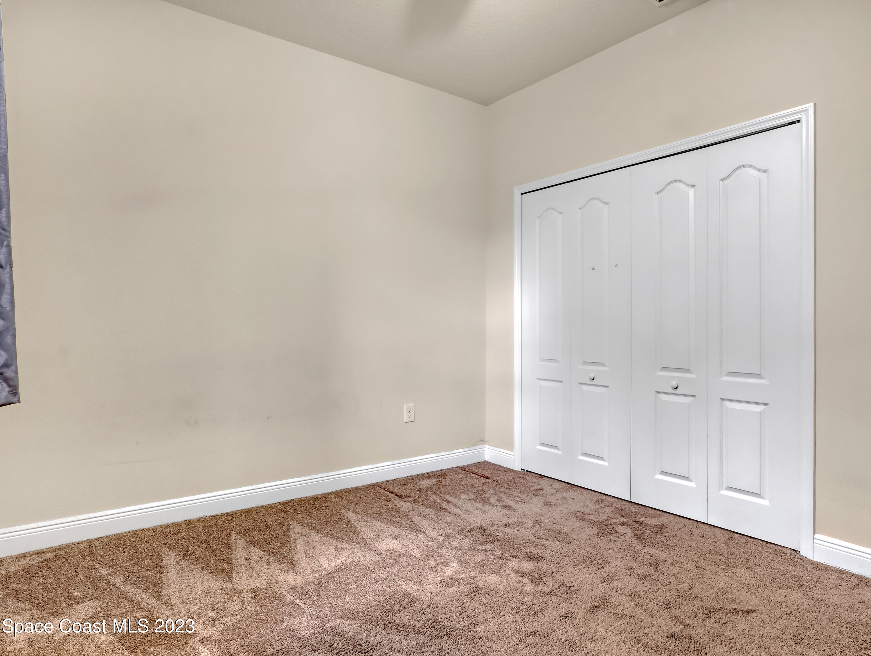 1310 Gaucho Road Southwest Palm Bay, FL 32908 - Photo 25 of 32 a view of an empty room