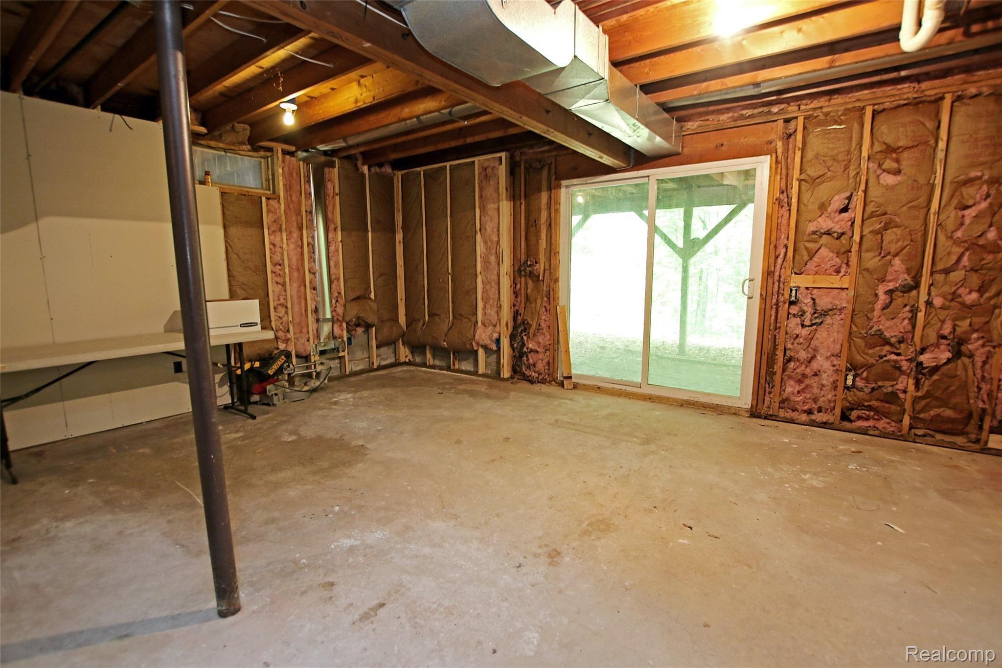 310 North Van Road Holly, MI 48442 - Photo 44 of 75 43) Lower Level Family Room.jpg