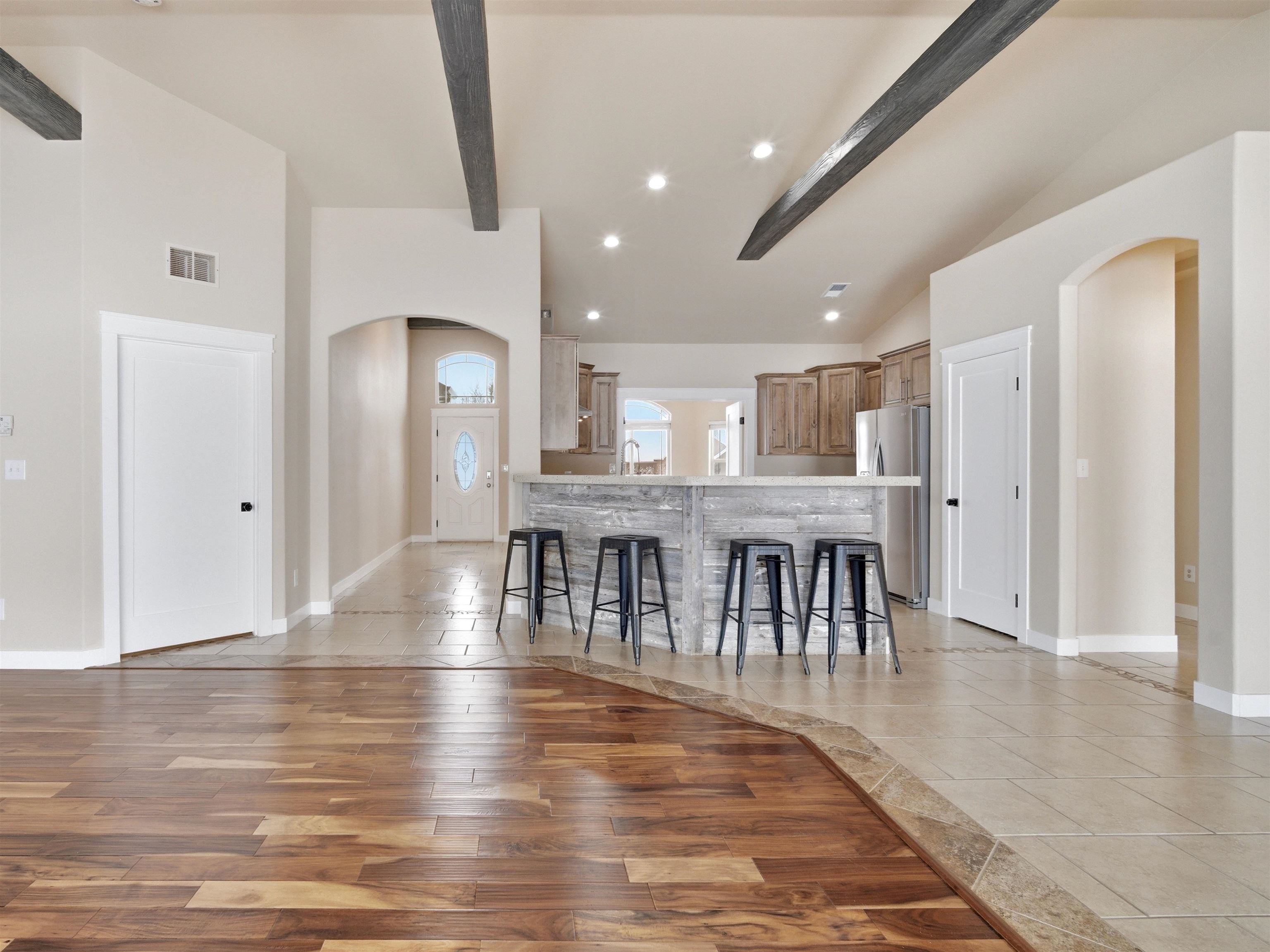 1850 Golden Ranch Road Fruita, CO 81521 - Photo 12 of 39 an open kitchen with a table and chairs
