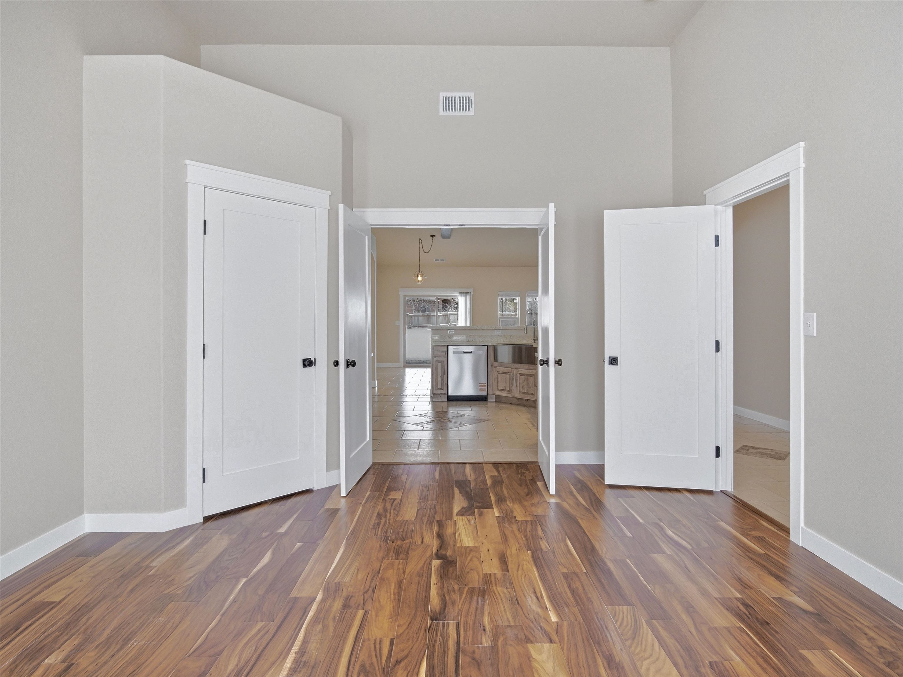 1850 Golden Ranch Road Fruita, CO 81521 - Photo 18 of 39 a view of a hallway with wooden floor