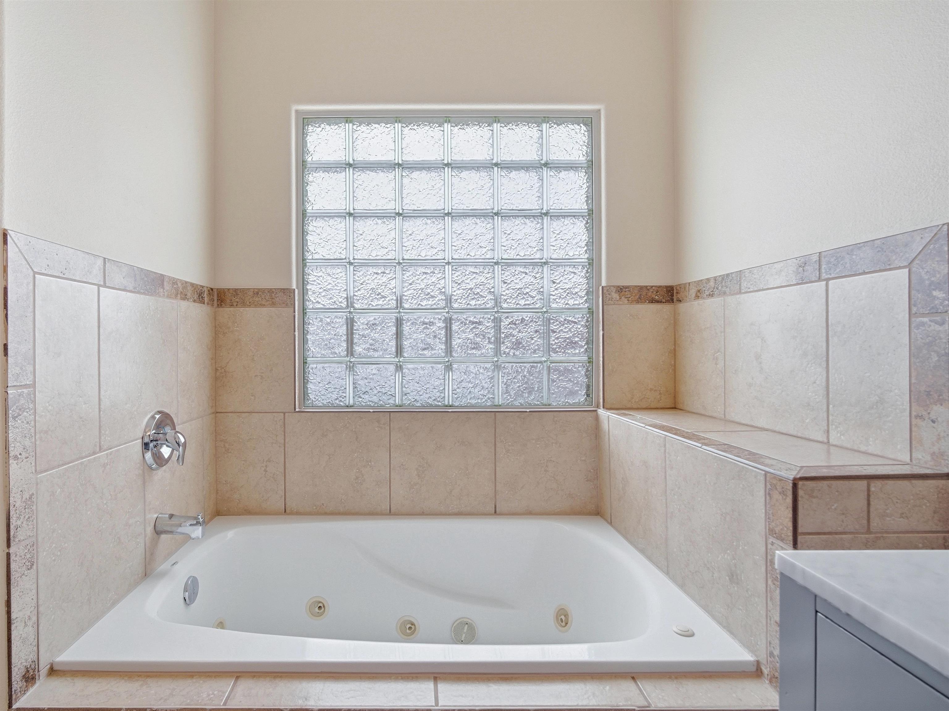 1850 Golden Ranch Road Fruita, CO 81521 - Photo 20 of 39 a bathroom with a bath tub and shower