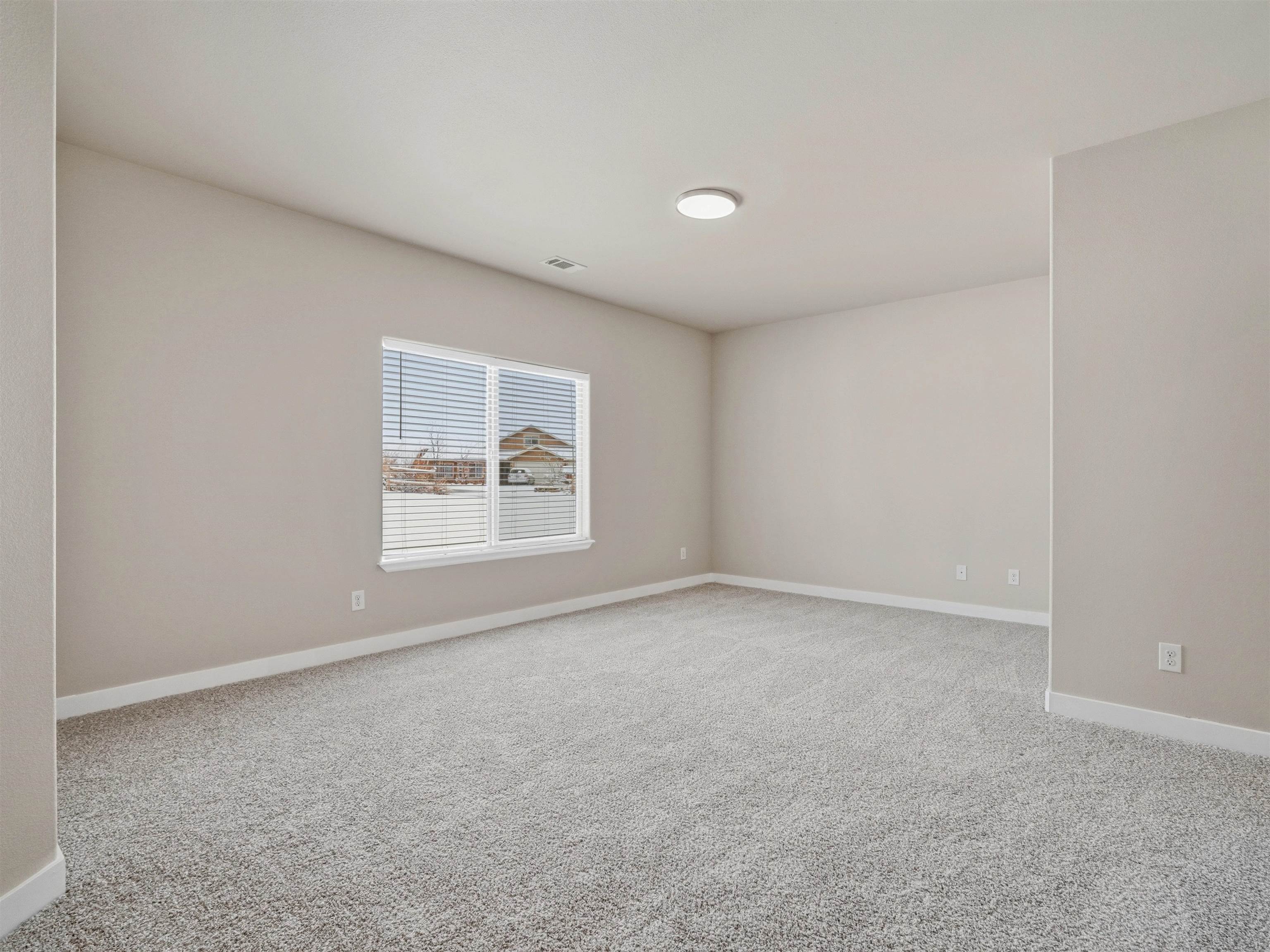 1850 Golden Ranch Road Fruita, CO 81521 - Photo 26 of 39 a view of an empty room with a window