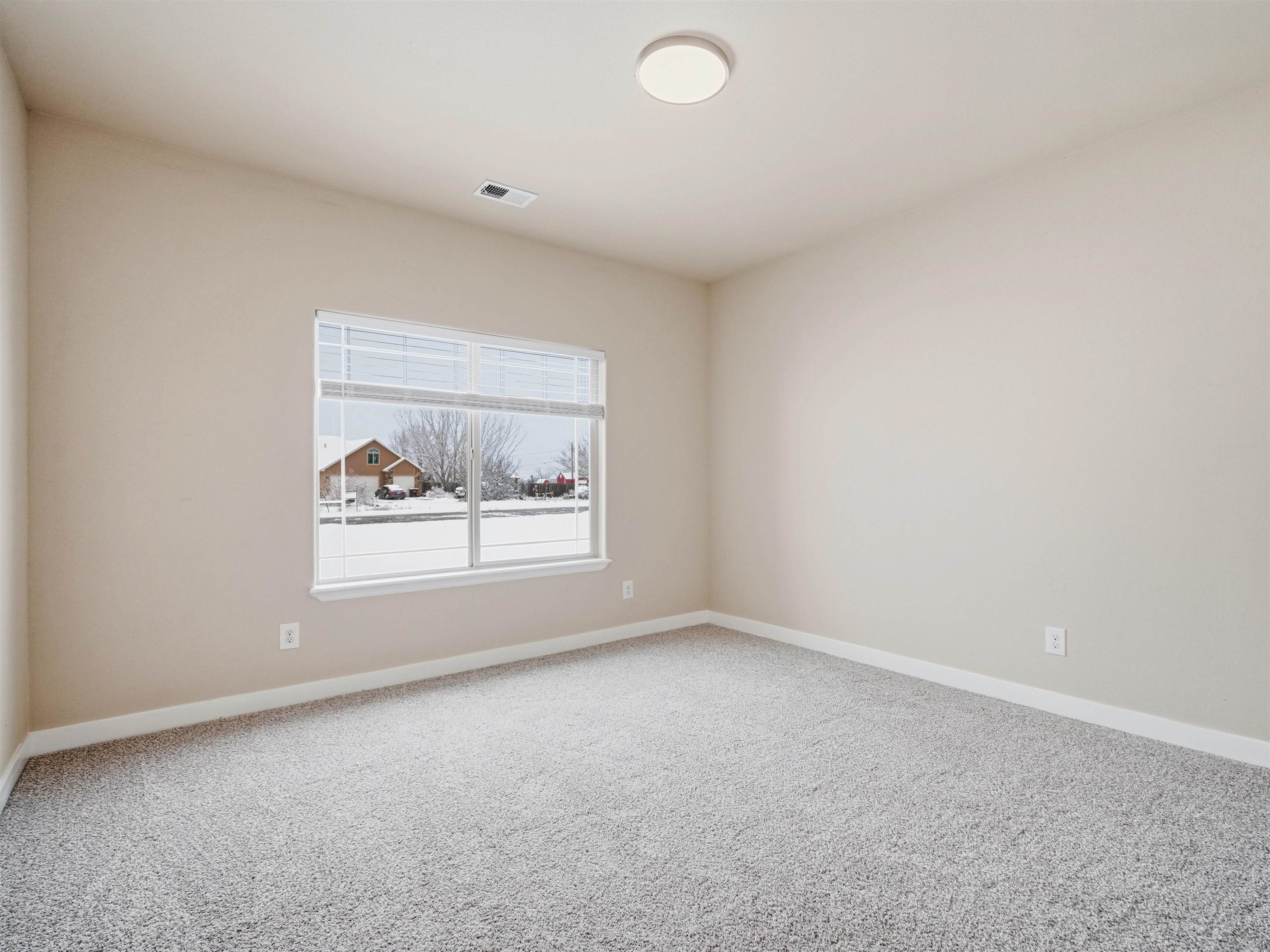1850 Golden Ranch Road Fruita, CO 81521 - Photo 27 of 39 an empty room with a window
