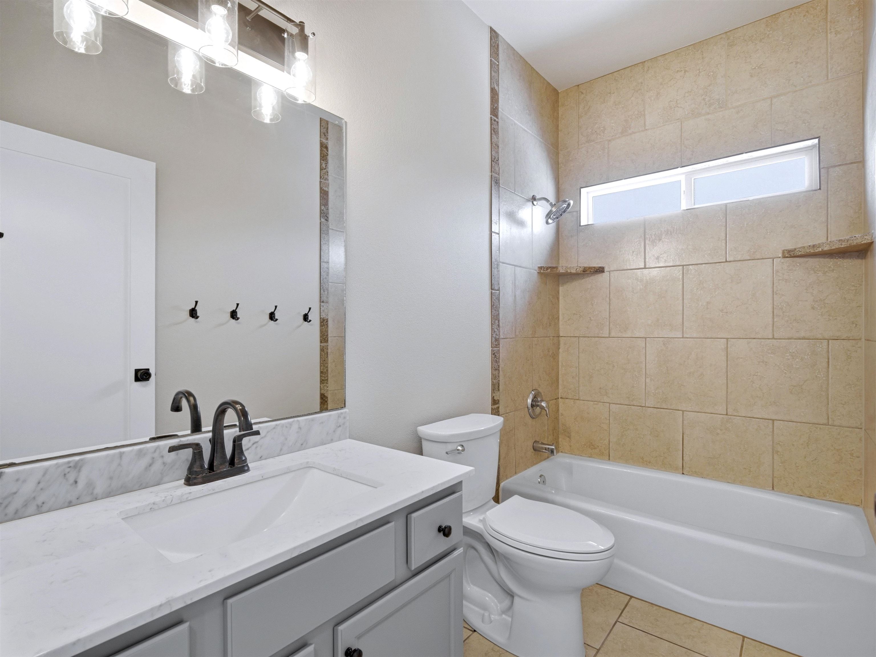 1850 Golden Ranch Road Fruita, CO 81521 - Photo 29 of 39 a bathroom with a sink a toilet and shower