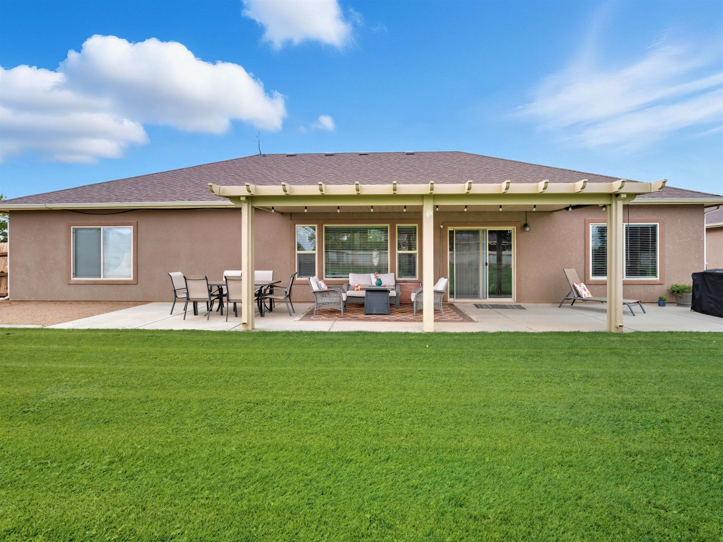 1850 Golden Ranch Road Fruita, CO 81521 - Photo 33 of 39 a front view of a house with patio