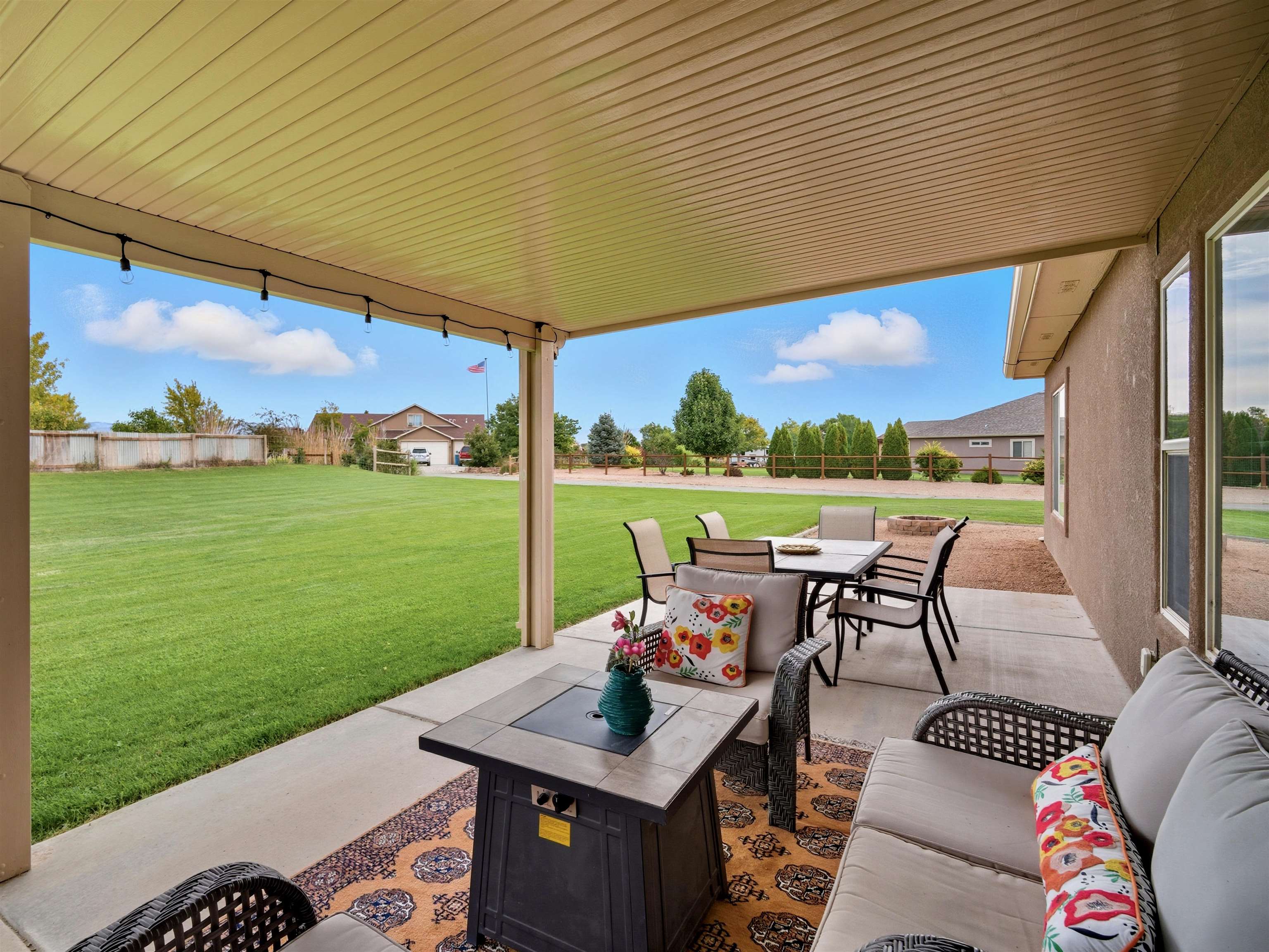 1850 Golden Ranch Road Fruita, CO 81521 - Photo 34 of 39 a view of a patio with a table chairs and a table