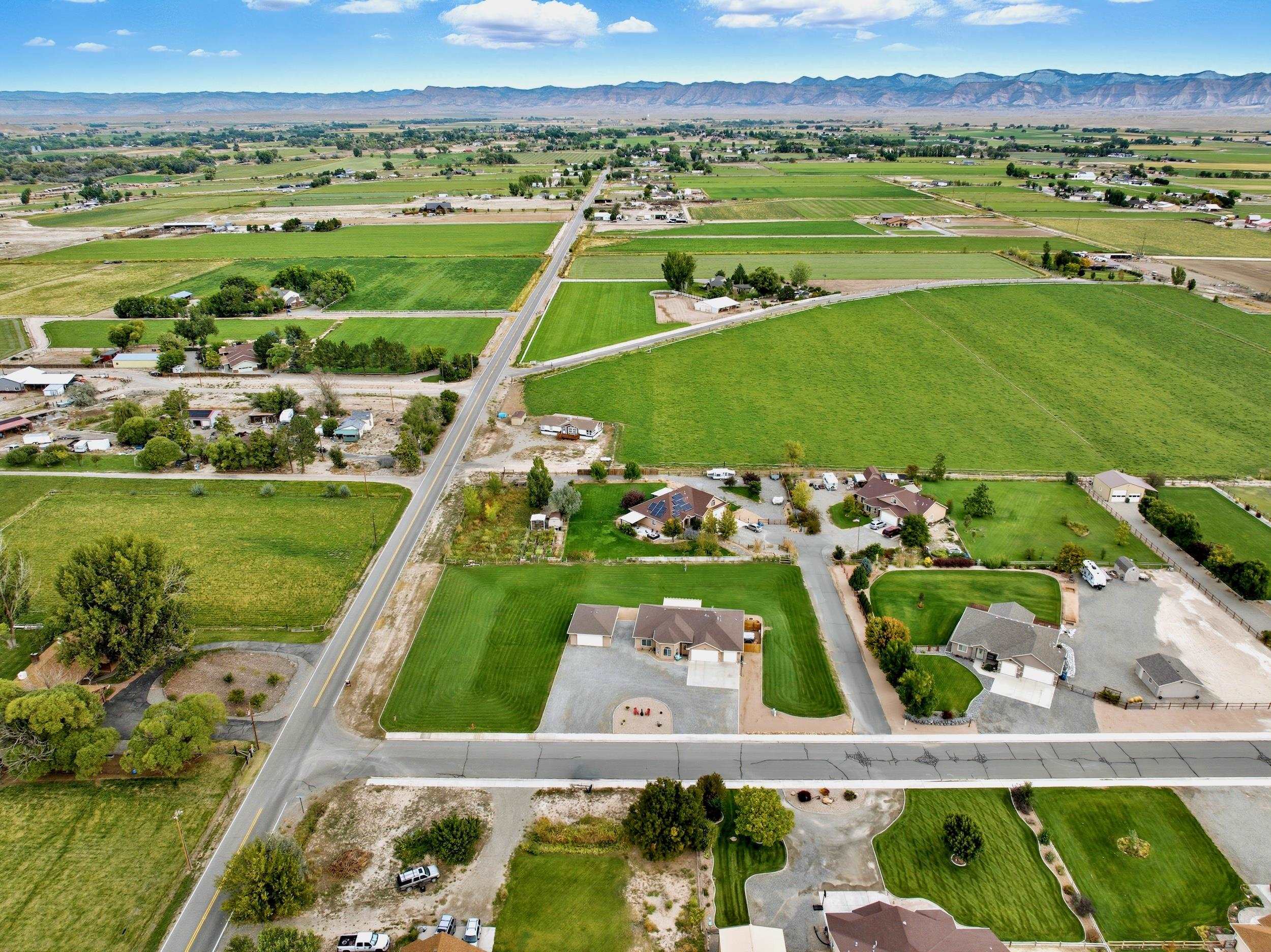 1850 Golden Ranch Road Fruita, CO 81521 - Photo 37 of 39 a view of a city with mountains in the background