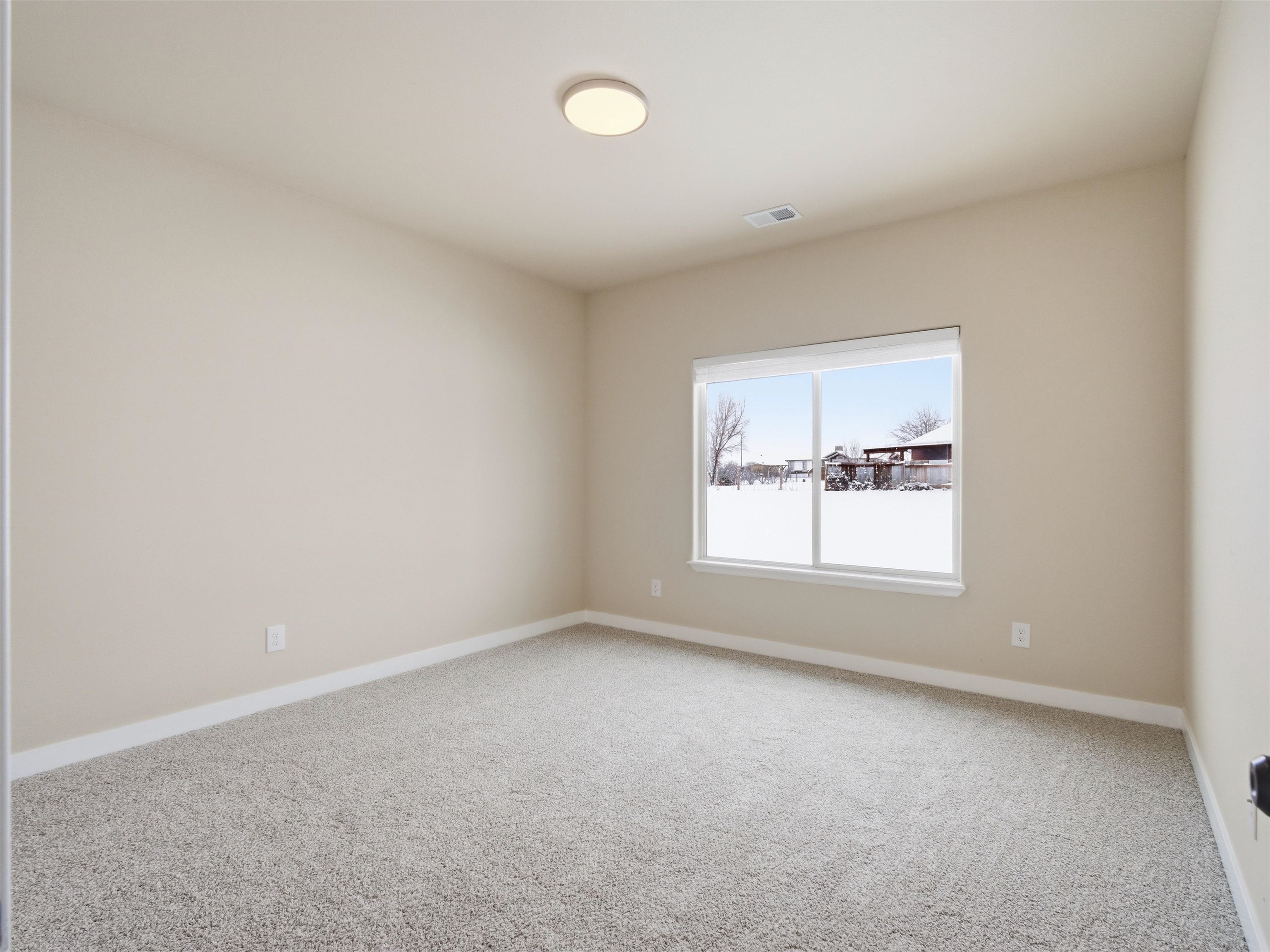1850 Golden Ranch Road Fruita, CO 81521 - Photo 8 of 39 an empty room with a window