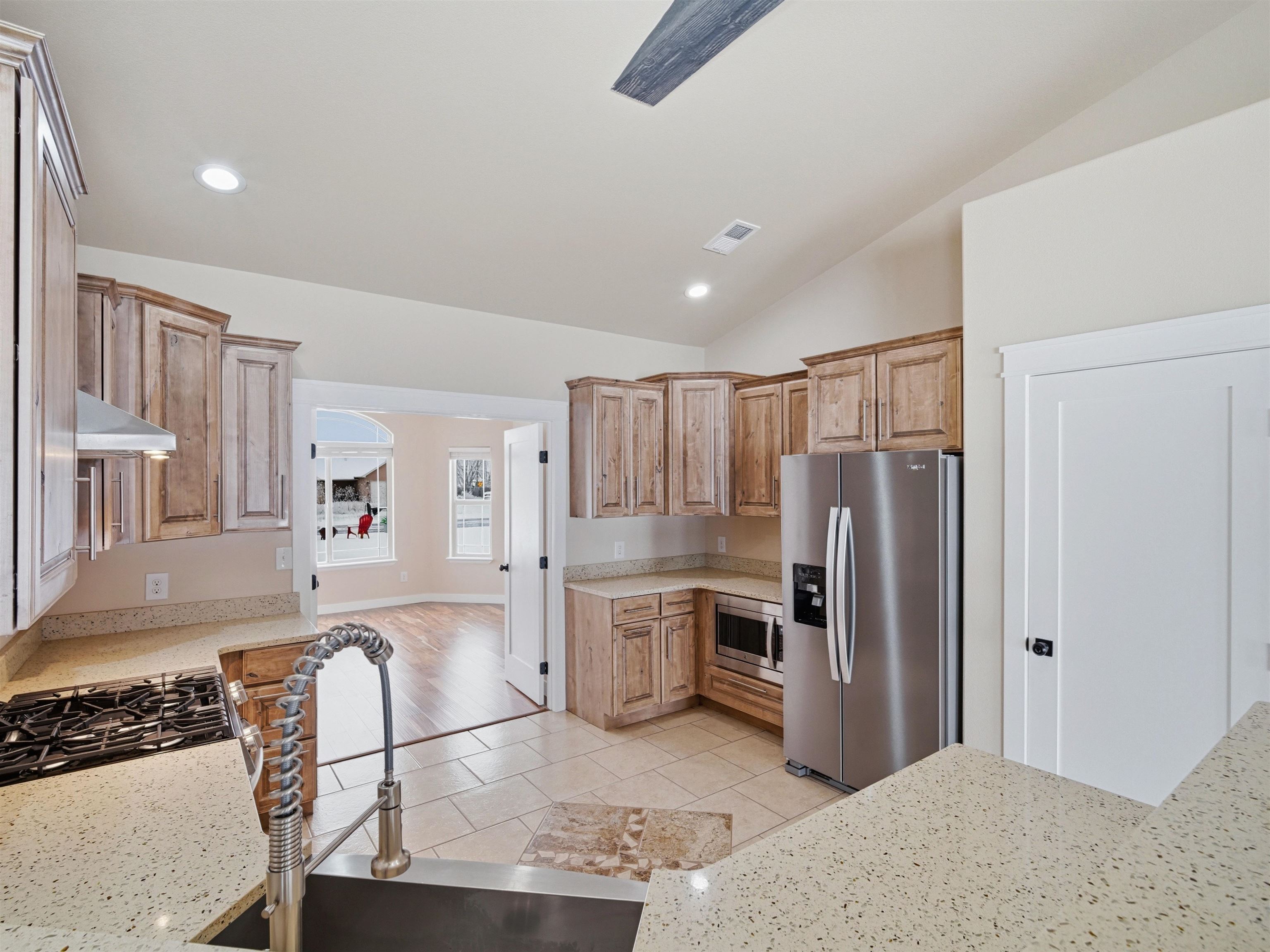 1850 Golden Ranch Road Fruita, CO 81521 - Photo 9 of 39 a kitchen with stainless steel appliances granite countertop a refrigerator and stove