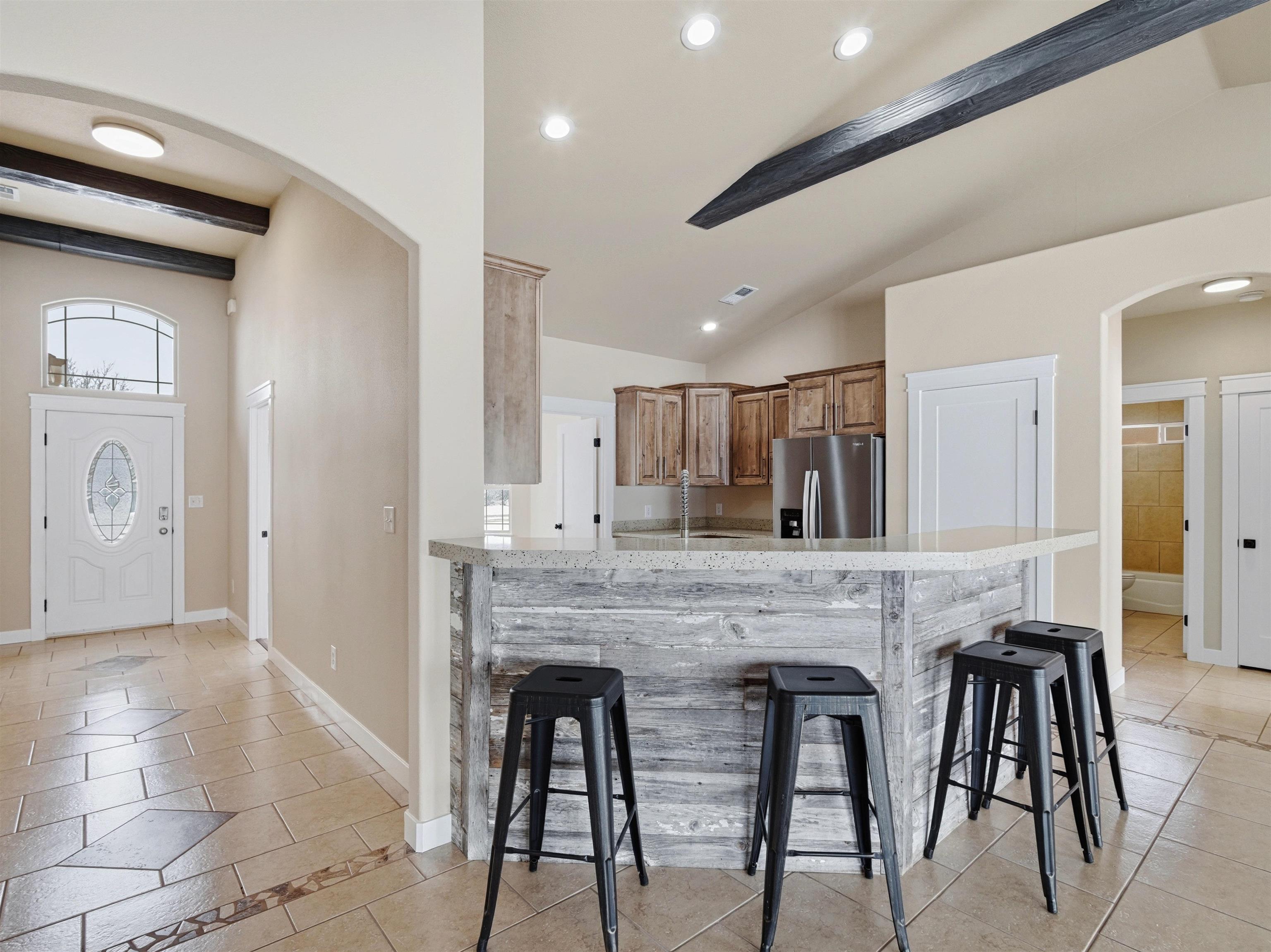 1850 Golden Ranch Road Fruita, CO 81521 - Photo 10 of 39 a kitchen with dining table and chairs