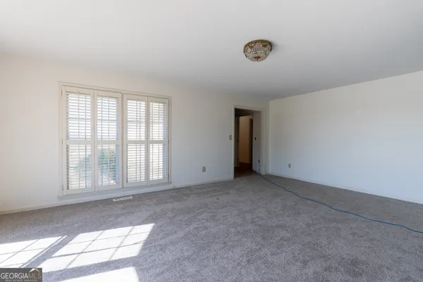 an empty room with windows