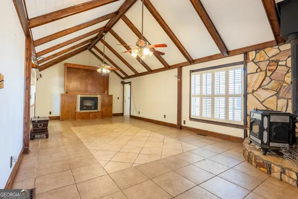 a view of livingroom with furniture and flat screen tv