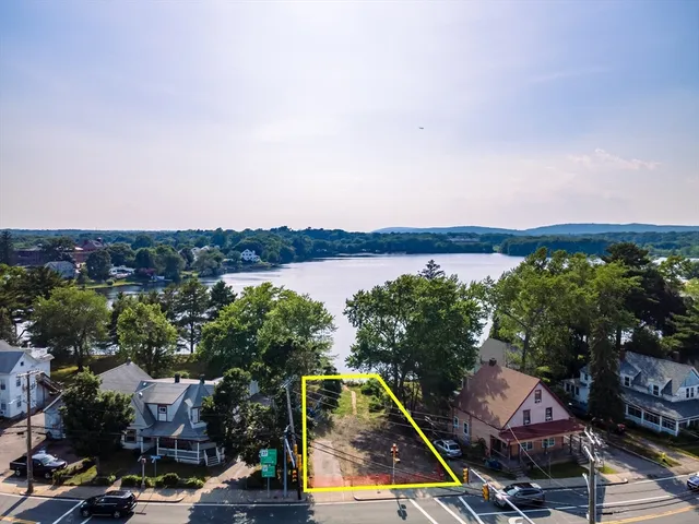 an aerial view of multiple houses with outdoor space