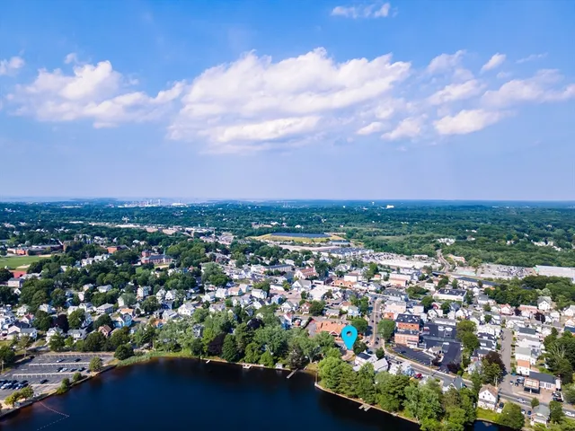 an aerial view of a city with lots of residential buildings