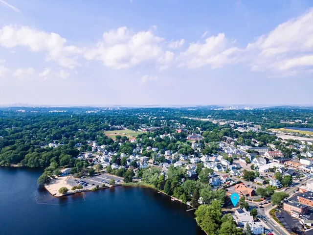 an aerial view of a city with lots of residential buildings
