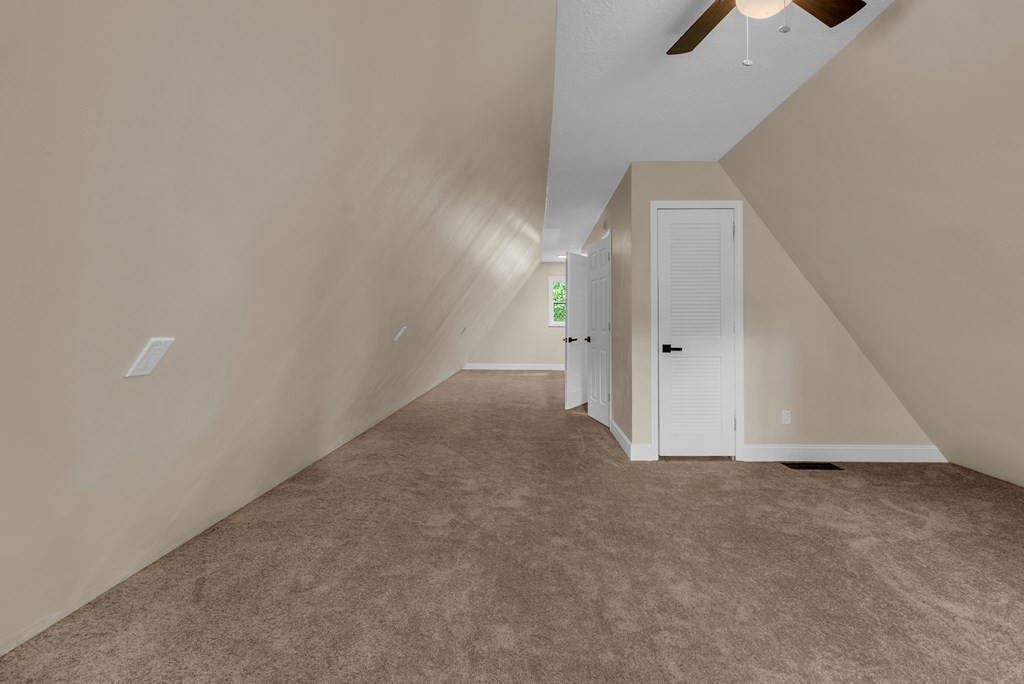 152 Parker Road Sparta, TN 38583 - Photo 15 of 30 a view of an empty room with a ceiling fan