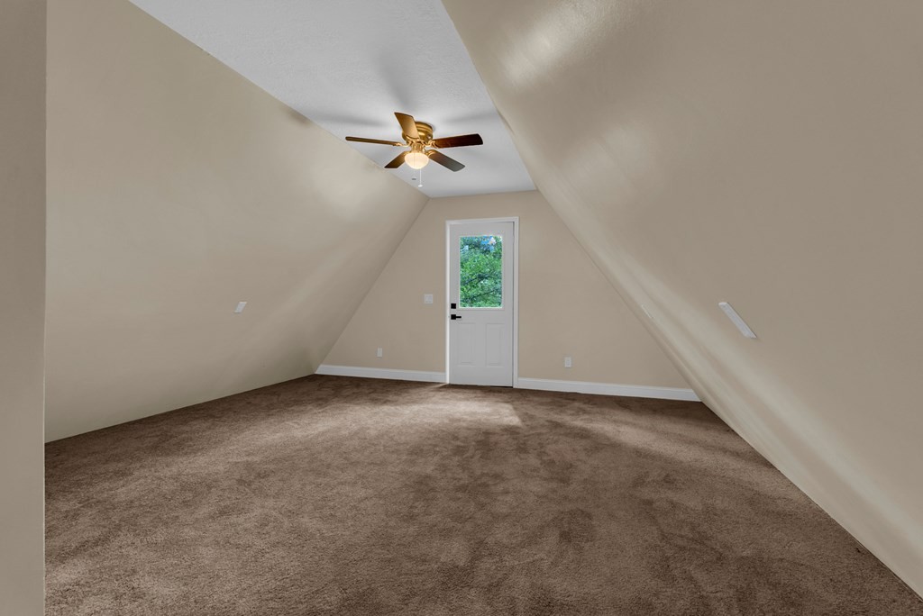 152 Parker Road Sparta, TN 38583 - Photo 19 of 30 an empty room with windows and fan