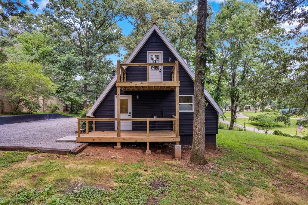 152 Parker Road Sparta, TN 38583 - Photo 22 of 30 a view of a house with a yard
