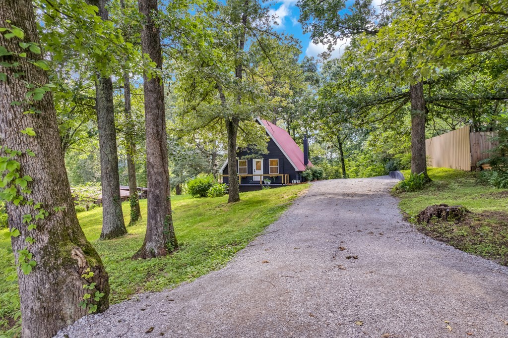 152 Parker Road Sparta, TN 38583 - Photo 27 of 30 a view of a house with a yard and tree s