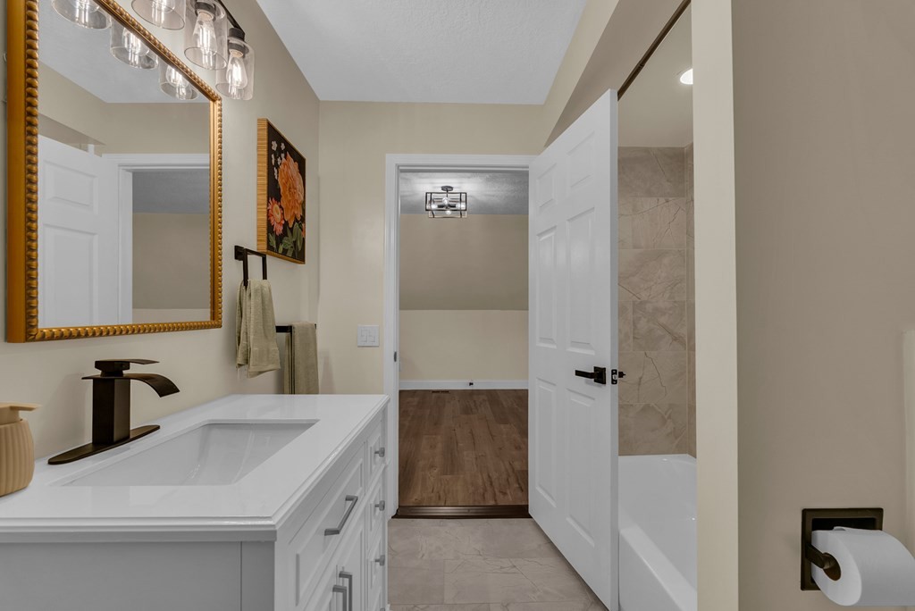 152 Parker Road Sparta, TN 38583 - Photo 10 of 30 a bathroom with a sink and a mirror