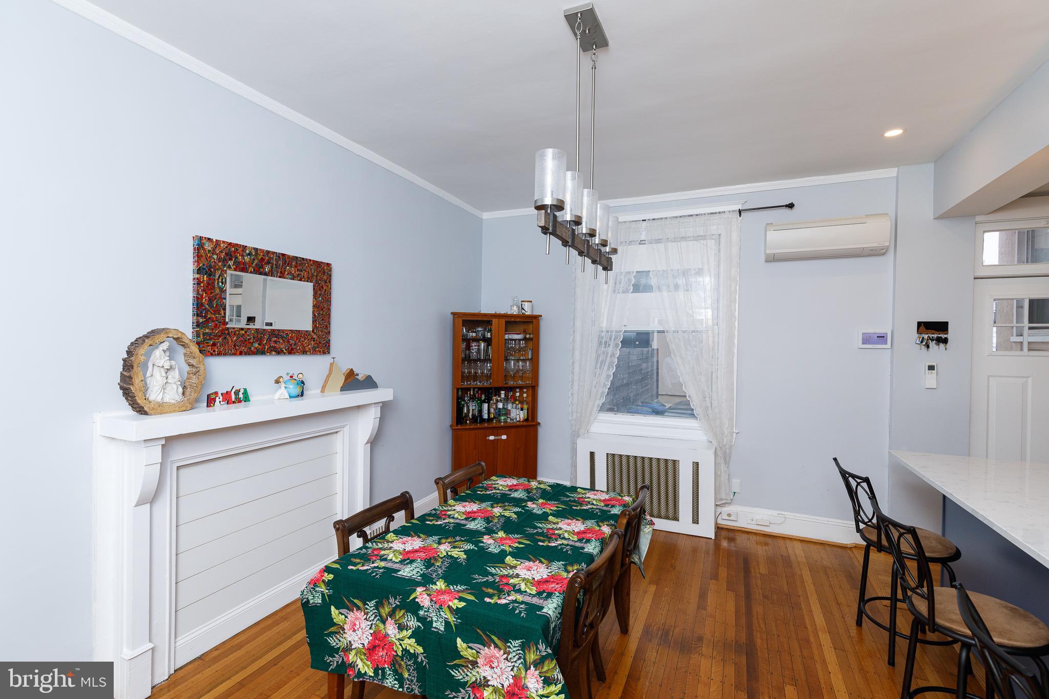 1113 Clifton Street Northwest Washington, DC 20009 - Photo 15 of 44 a very nice looking room with a table and chairs