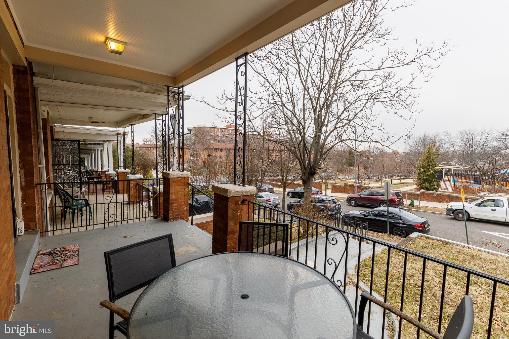 1113 Clifton Street Northwest Washington, DC 20009 - Photo 2 of 44 a view of a patio with couches table and chairs