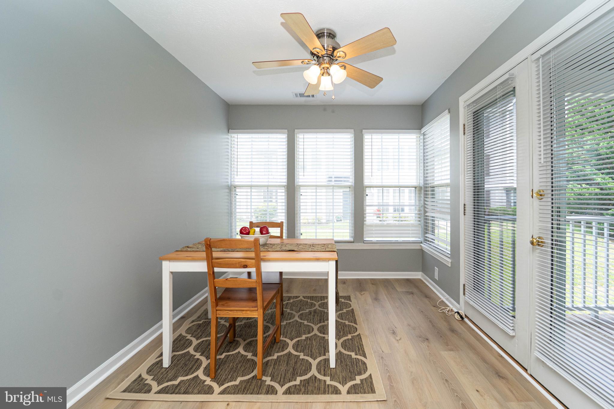 16 Laurel Path Court, Unit 1 Baltimore, MD 21236 - Photo 18 of 28 a dining room with furniture and window