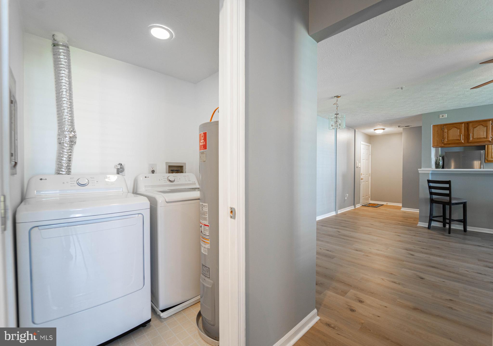 16 Laurel Path Court, Unit 1 Baltimore, MD 21236 - Photo 26 of 28 a view of storage and utility room with washer and dryer