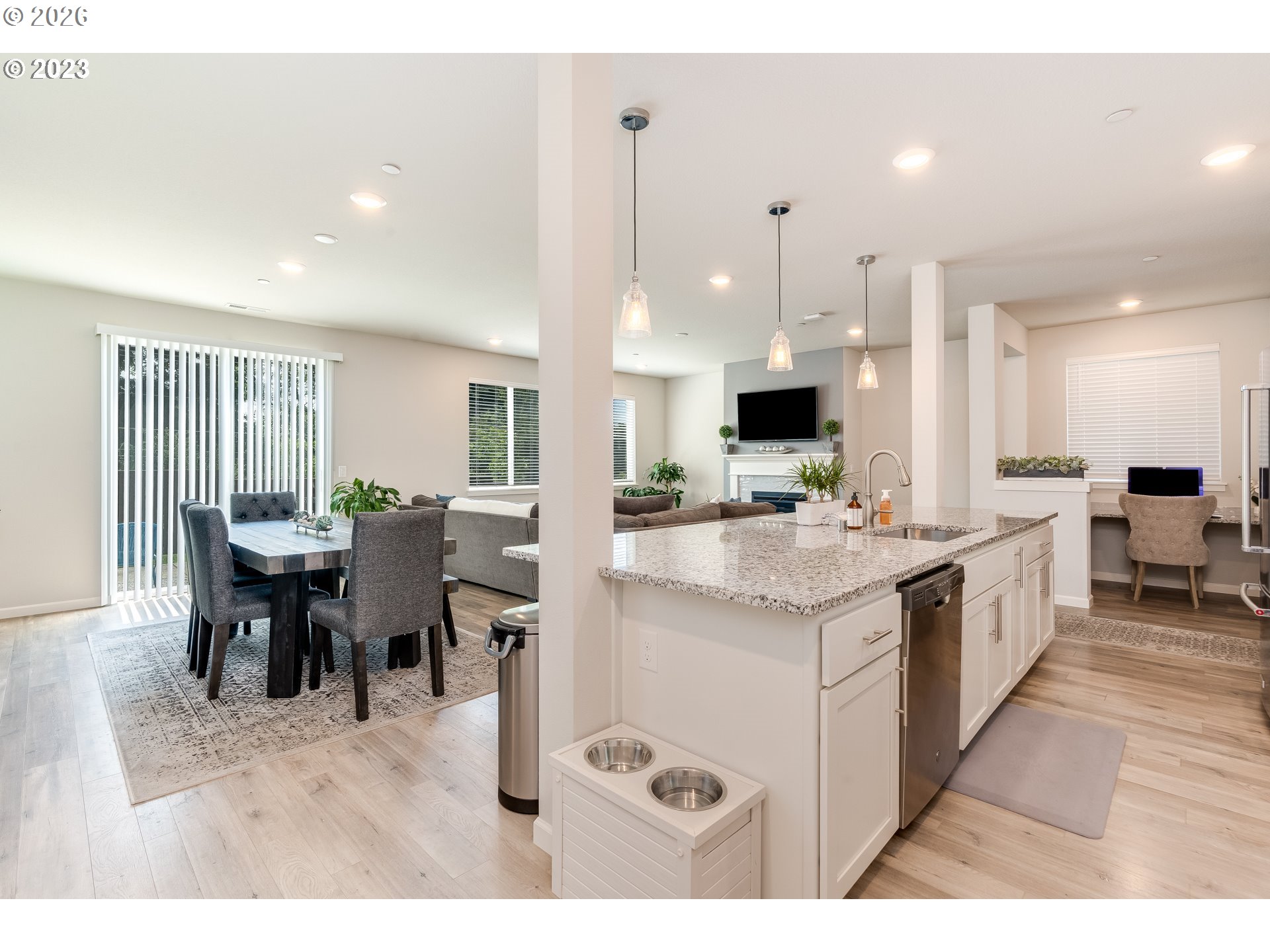 6150 North 86th Avenue Camas, WA 98607 - Photo 14 of 41 a large kitchen with kitchen island a sink table and chairs
