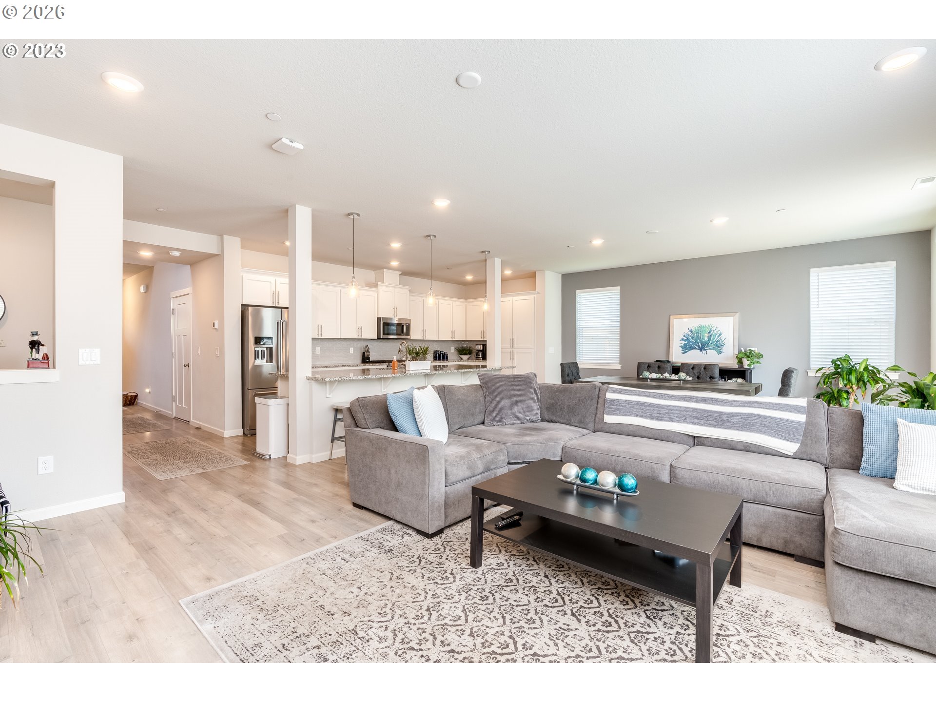 6150 North 86th Avenue Camas, WA 98607 - Photo 21 of 41 a living room with furniture and kitchen view