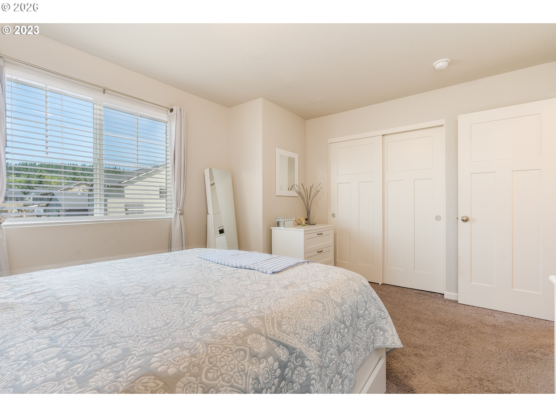 6150 North 86th Avenue Camas, WA 98607 - Photo 23 of 41 a bedroom with a bed and a window