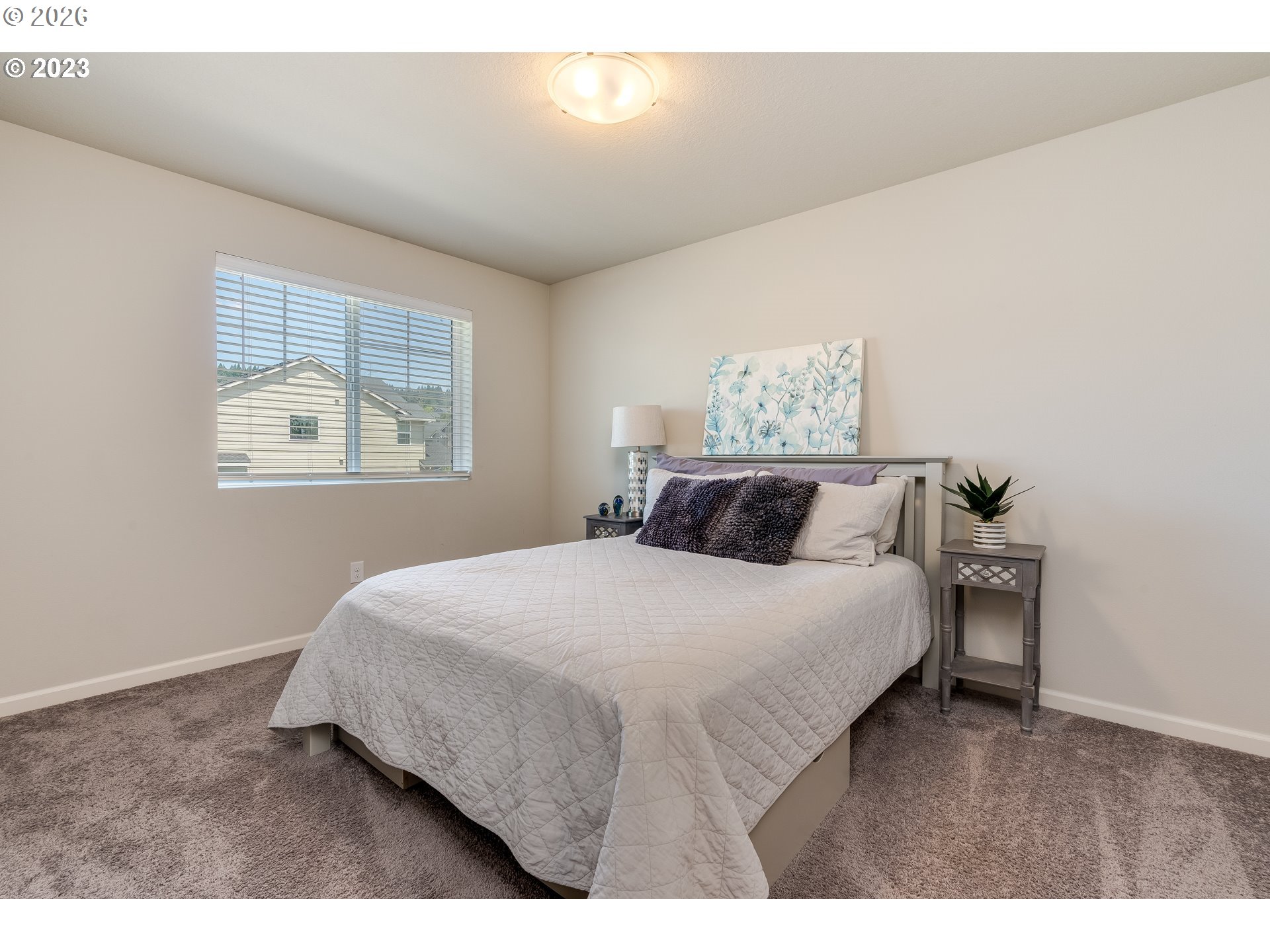6150 North 86th Avenue Camas, WA 98607 - Photo 24 of 41 a bedroom with a bed and window