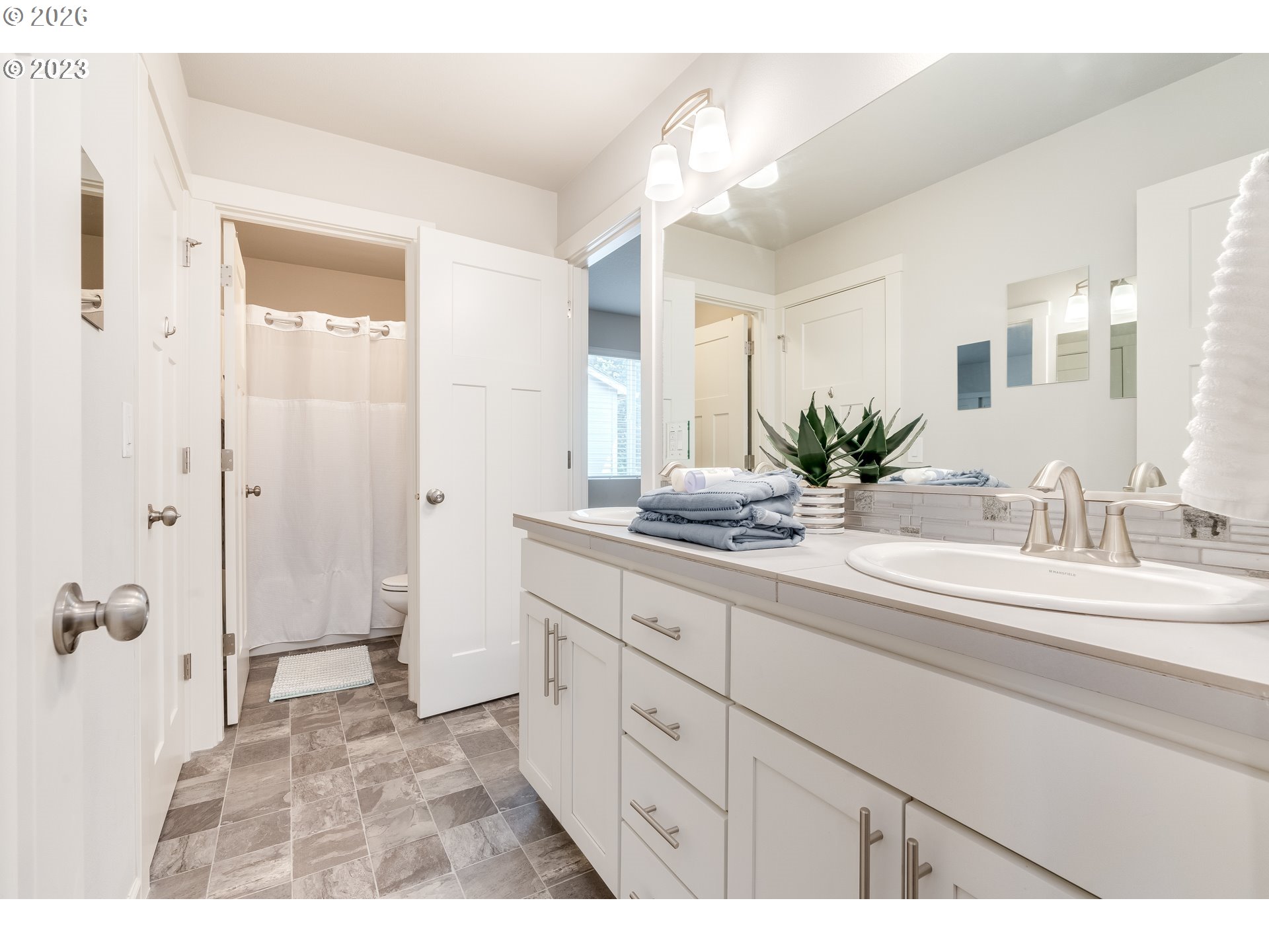 6150 North 86th Avenue Camas, WA 98607 - Photo 26 of 41 a bathroom with a sink and a mirror