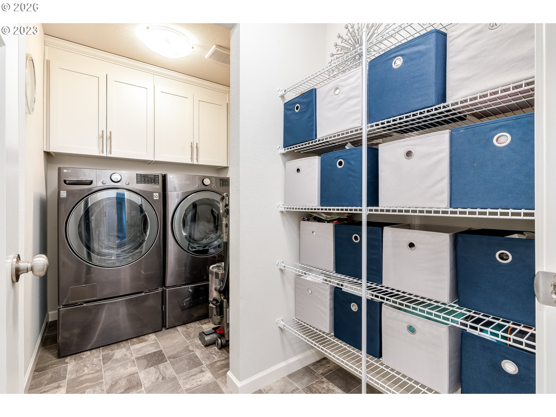 6150 North 86th Avenue Camas, WA 98607 - Photo 28 of 41 a view of cabinets with washer and dryer